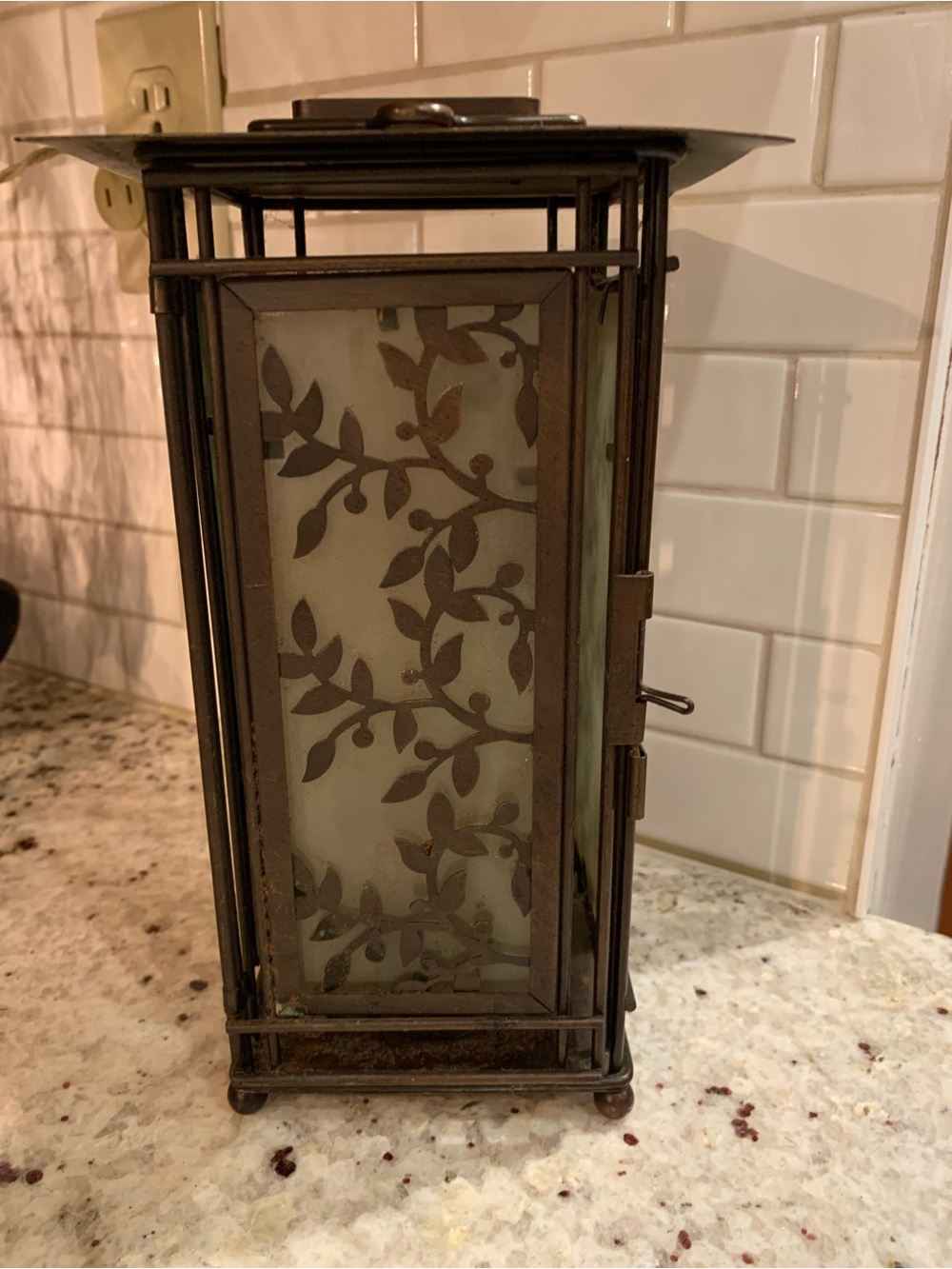 Bronze cottage core metal vine leaf lantern.
